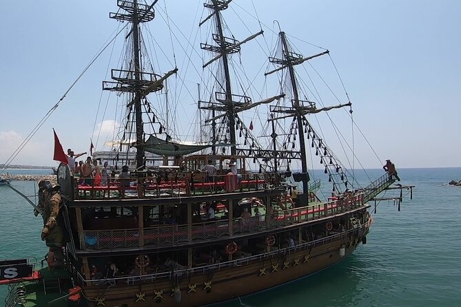 Alanya Catamaran Boat Tour with Lunch, Soft Drinks & Transfer - Kleopatra Beach Swimming Stop