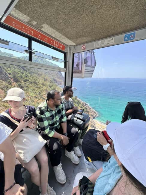 Alanya City Tour: Cleopatra Beach & Optional Cable Car Ride - Seeing the Red Tower from the harbor area