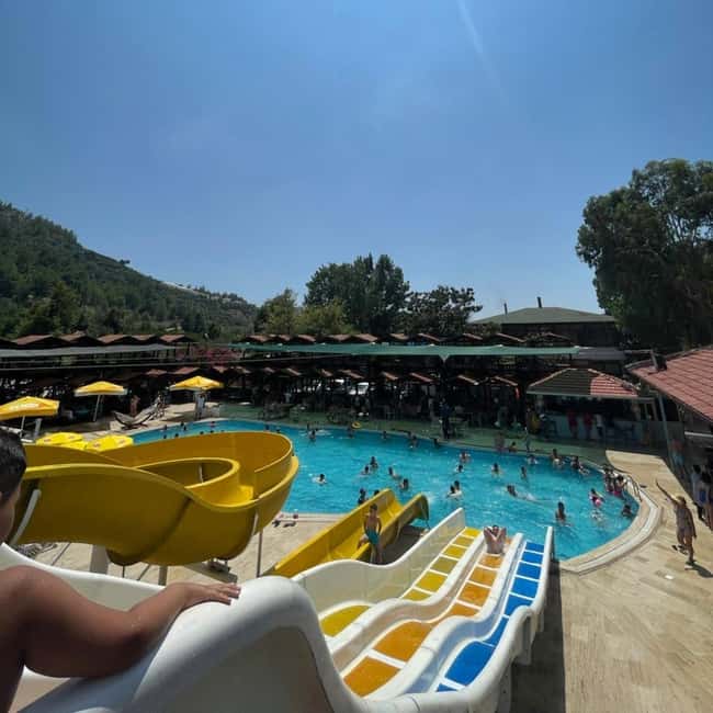 Alanya: Dim Cave, Dim River Tour With Lunch and Fresh Fruits - Dam lake, bridge photographs, and music