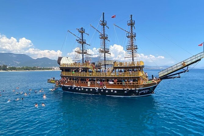 Alanya Grand Pirate Boat Tour with Lunch, Soft Drinks & Transfer - Caves, cliffs, and swimming stops