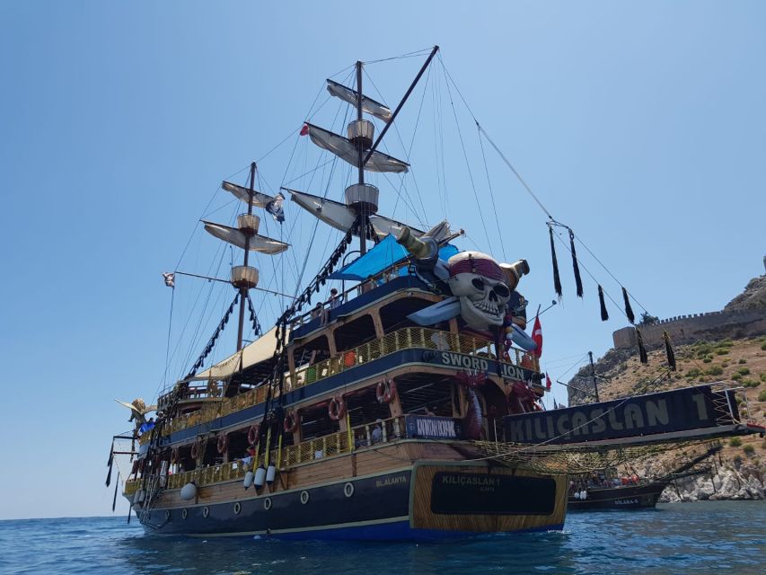 Alanya: Pirate Boat Tour w/ BBQ & Foam Party - Coastal caves with a pirate-story feel