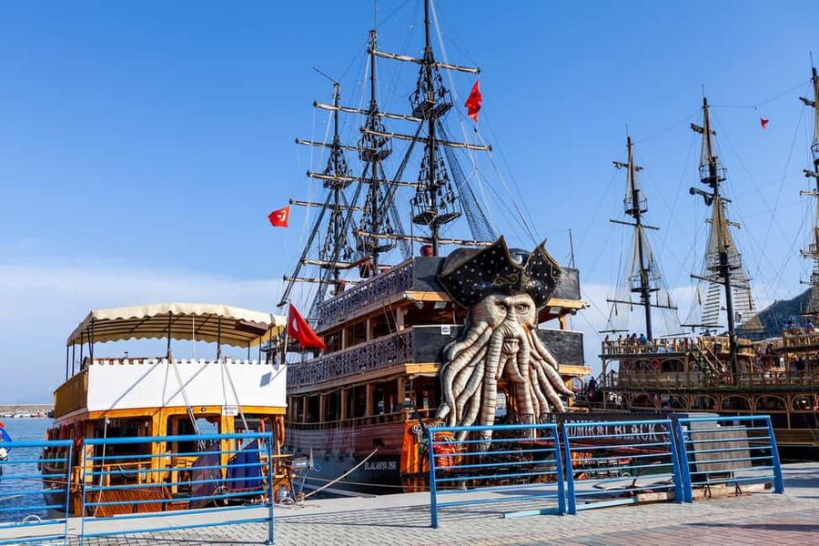 Alanya: Pirate Boat Trip with Lunch and Drinks - Leaving the harbor with the Red Tower ahead