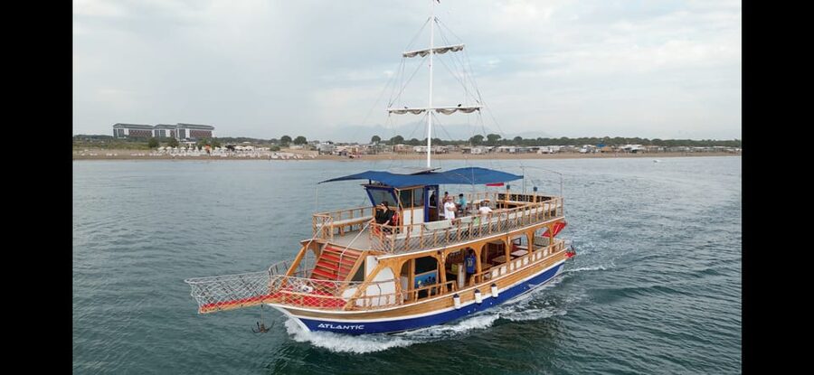 Antalya: Beach & Waterfalls Boat Trip w/ Lunch & Soft Drinks - Pickup, port delays, and the first hour