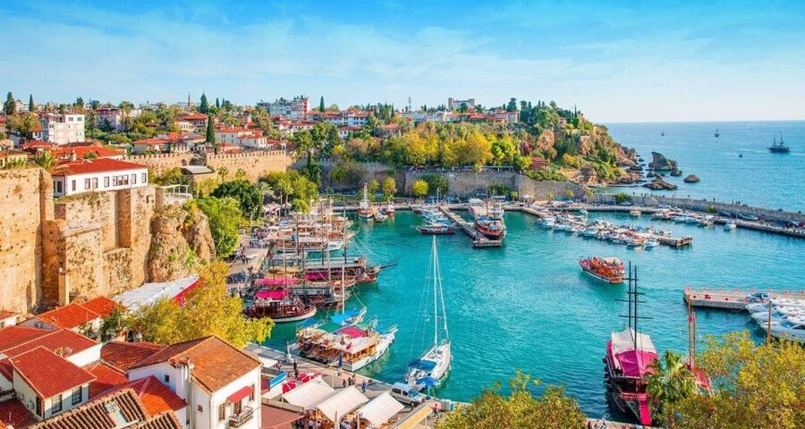 Antalya: Guided Old Town Tour with Boat Trip and Lunch - Walking through Kaleiçi and its old walls