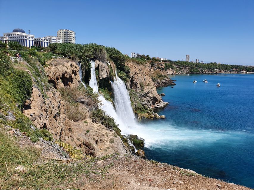 Antalya: Relax Boat Trip with Lunch to the Duden Waterfall - Following the cliffs toward the Mediterranean