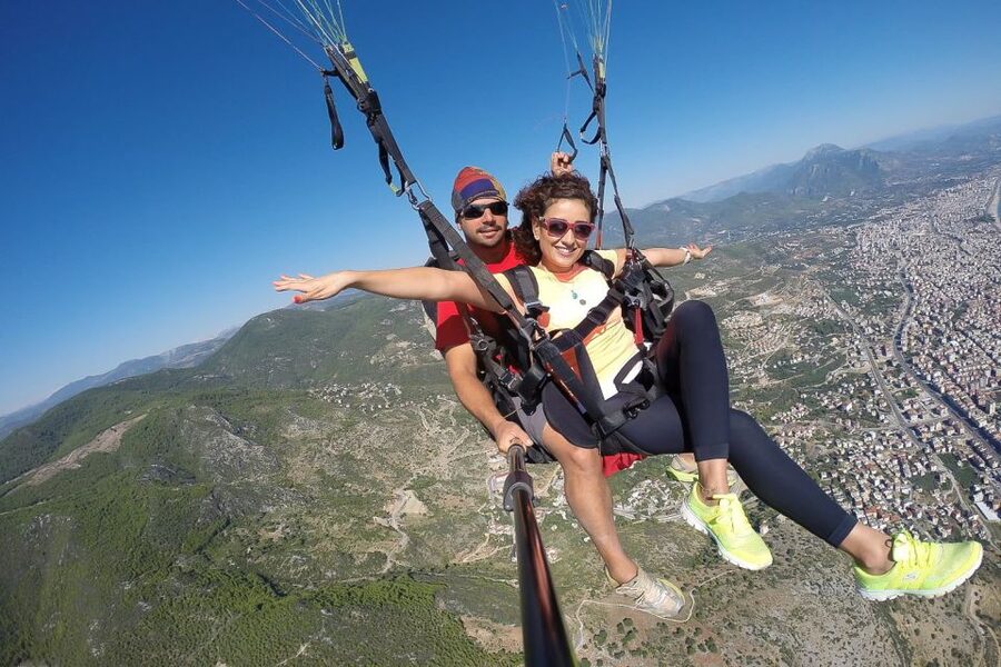 Antalya: Tandem Paragliding Experience with Transfer - Taking off above Alanya’s coast