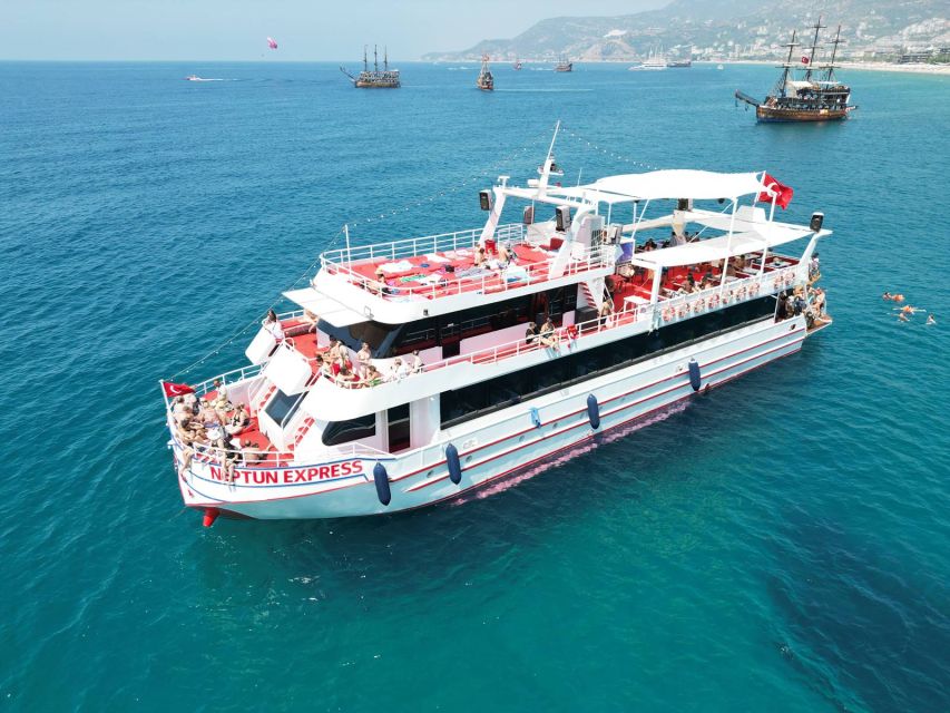 From Alanya: Boat Tour with Unlimited Soft Drinks and Lunch - Ulas Beach brings another chance to get in the water