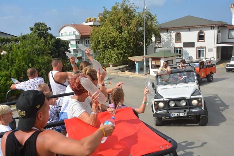 From Alanya: Jeep Safari with Lunch, Dim River & Cave - A traditional village and local fruit