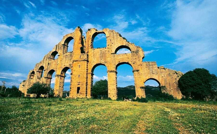From Antalya: Day Tour of Ancient Roman Sites - Side: ancient ruins beside the Mediterranean