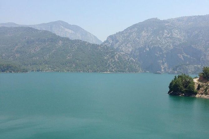 Green Canyon Magic: Scenic Boat Tour for Nature Lovers - What the guide and insurance add