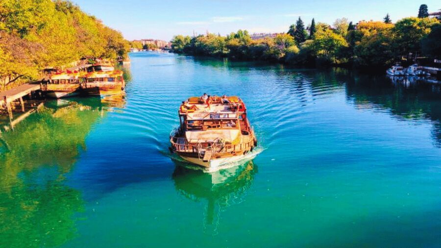 Manavgat River Cruise With Waterfall & Bazaar Tour - A river, a waterfall, and a market in one long day