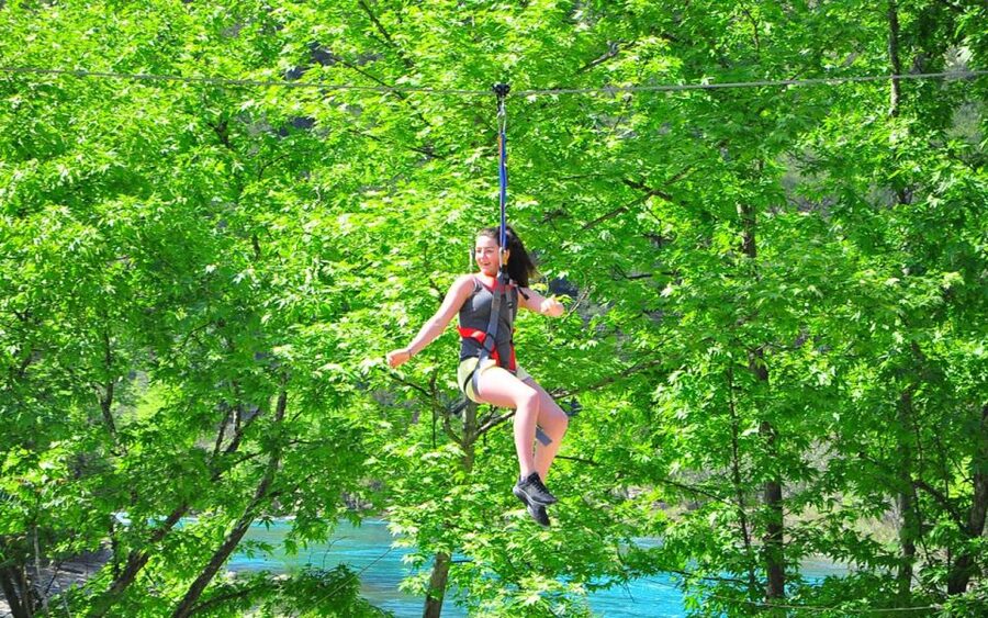 Mix Combo Adventure Tour: Zipline, River Rafting, Canyoning - Canyoning through cold mountain water