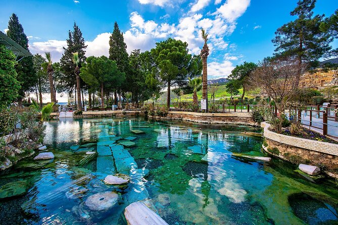 Pamukkale Hierapolis Cleopatra Pool Tour with Lunch from Antalya - Walking through Hierapolis above the springs