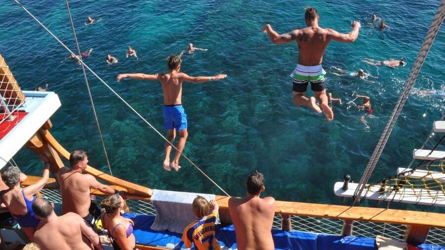 Side: Blue Laguna Boat Tour with Free Lunch & Drinks - From river views to open Mediterranean water