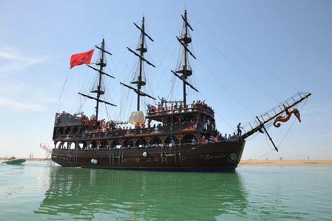 "Side: Boat Adventure to Dolphin Island – Swim and Enjoy Lunch" - Swimming, Snorkeling, and Time on the Water