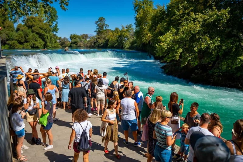 Side: Manavgat River Boat Trip & Grand Market w/ Lunch - Boarding the 45-passenger wooden boat